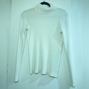 Ribbed cream turtleneck sweater. Size M. Light weight. Perfect for layering!